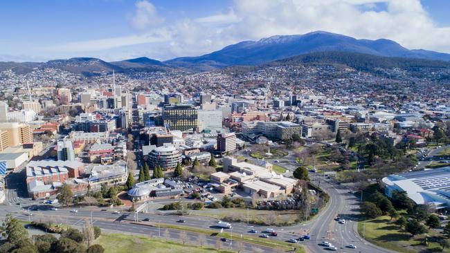 Hobart aerial showing new Remembrance Bridge, ABC ( Railway ) roundabout and the CBD. Mt Wellington with snow. Menzies / Macquarie Street / File / Generic / Drone