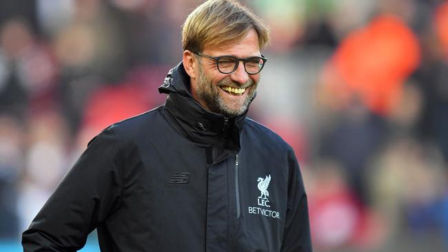 Liverpool manager Jurgen Klopp smiles before the English Premier League soccer match against Sunderland.