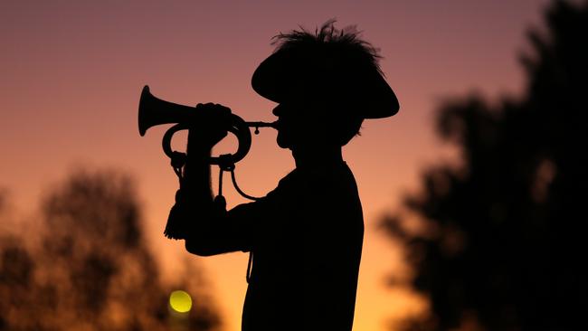 Braxton Jones of the 1/15th RNSW Lancers plays The Last Post in Sydney. Picture: AAP