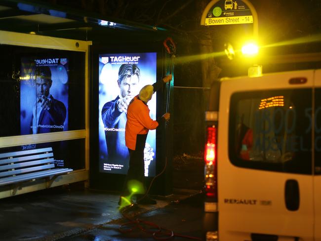 #SnapBrisbane Snap Brisbane.   Phill Tegg of Arana Hills from Adshell cleaning a local bus shelter in Lutwyche.   Picture: Josh Woning.