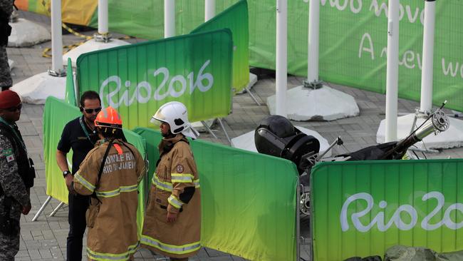 Officials rope off the area impacted by the fallen camera. Picture: Alex Coppel.