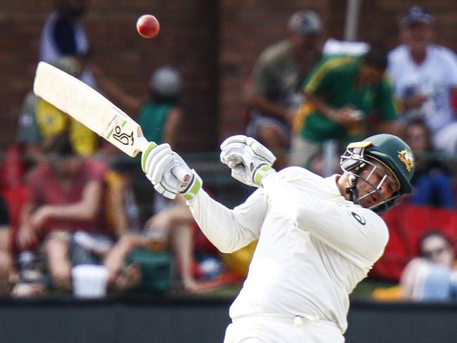 Australia's Usman Khawaja evades a short ball.