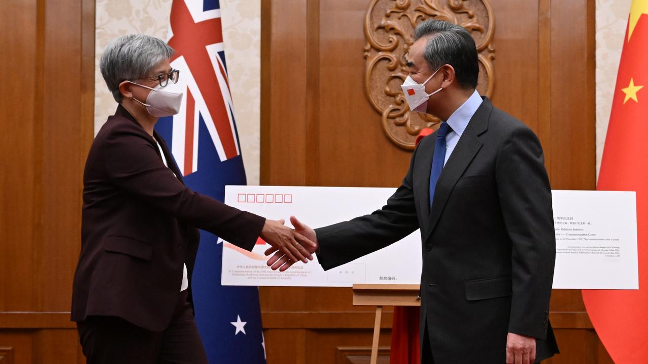 Foreign Minister Penny Wong met with Chinese Foreign Minister Wang Yi in Beijing for a ceremony commemorating the 50th anniversary of diplomatic relations between Australia and China. Picture: AAP / Lukas Coch via NCA NewsWire