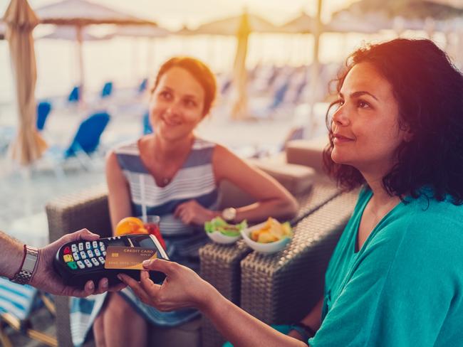 Credit card fees can quickly add up while overseas.