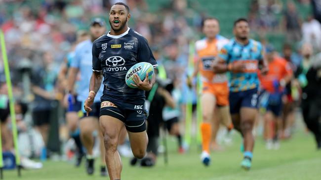 Hamiso Tabuai-Fidow takes off during the NRL Nines tournament. Photo: Richard Wainwright/ AAP Image