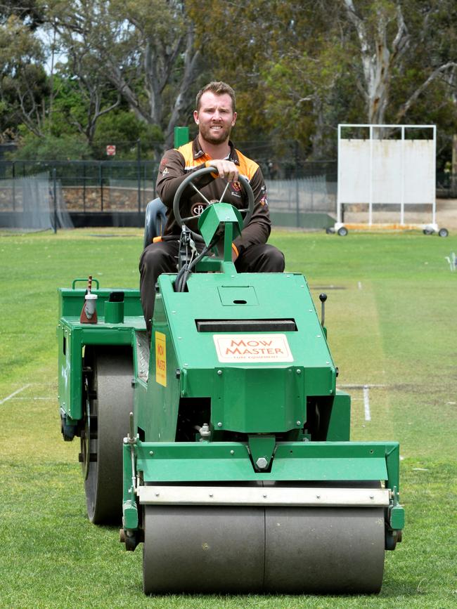 Jake Brown at work as a curator at Kensington’s home ground, Parkinson Oval. Picture Greg Higgs