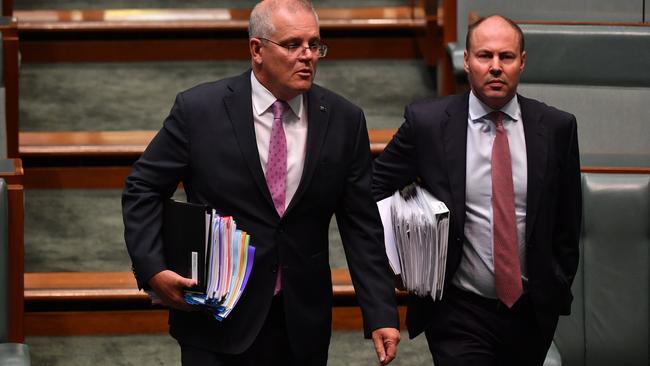 Prime Minister Scott Morrison (L) and Treasurer Josh Frydenberg arrive for Question Time in the House of Representatives at Parliament House on March 15, 2021. Picture: Getty Images