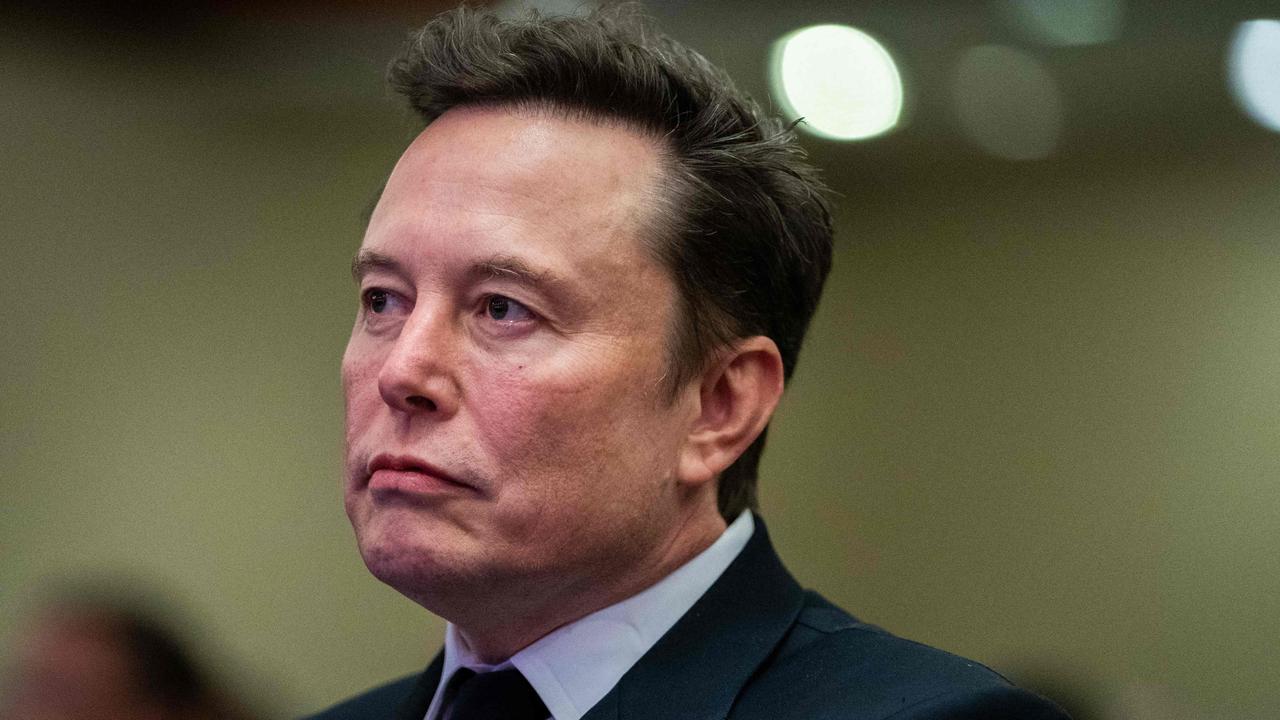 Elon Musk listens as US President-elect Donald Trump speaks during a meeting with House Republicans. Picture: Allison Robbert/AFP