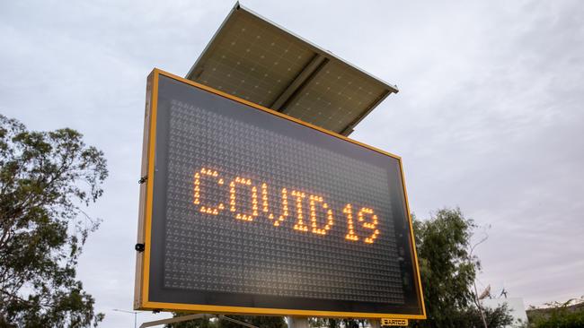 A solar-powered roadside sign in Alice Springs. Picture: Emma Murray