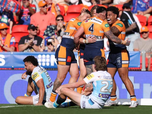 NEWCASTLE, AUSTRALIA - SEPTEMBER 01: Phoenix Crossland of the Knights celebrates a his try during the round 26 NRL match between Newcastle Knights and Gold Coast Titans at McDonald Jones Stadium, on September 01, 2024, in Newcastle, Australia. (Photo by Scott Gardiner/Getty Images)