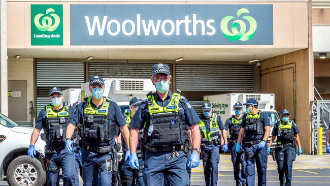 Anti lockdown protesters stage a flash rally at Chadstone Shopping Centre. Police arrive after the protesters dispersed. Picture: Jake Nowakowski