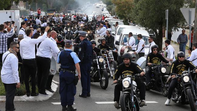 The couple’s wedding in Lidcombe involved helicopters, supercars, motorbikes, fighter jets and dancing drummers and closed off Frances St. Picture: Toby Zerna