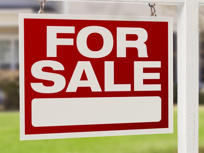 Home For Sale Real Estate Sign and House. Picture: THINKSTOCK