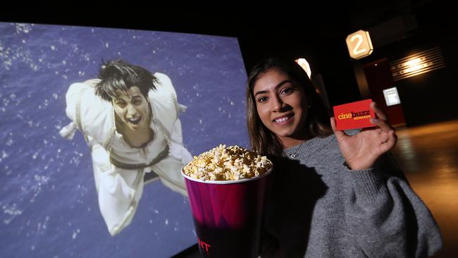 Montana Macarounas with her Event cinemas loyalty card at Event Cimemas Westfield Coomera. Picture: AAP Image/Richard Gosling.