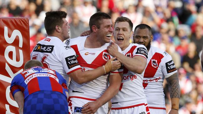 Jeremy Latimore of the Dragons celebrates scoring a second-half try during the Round 25 NRL match between the Newcastle Knights and the St George-Illawarra Dragons at McDonald Jones Stadium in Newcastle, Saturday, September 1, 2018. (AAP Image/Darren Pateman) NO ARCHIVING, EDITORIAL USE ONLY