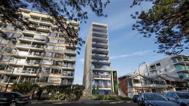 An artist’s impression of the 11-storey apartment building proposed for Colley Terrace, Glenelg. To the left is the existing St Vincent Towers building.