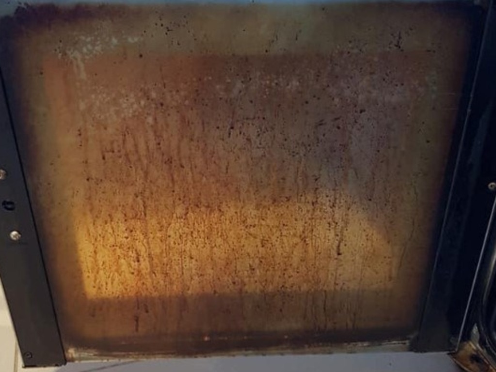 Before: The ‘ashamed’ mum-of-five shared this snap of her oven door covered in grease and baked-on grime. Picture: Facebook