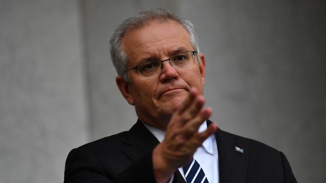 Scott Morrison wants to drive states towards the NSW model of local lockdowns. Picture: Getty