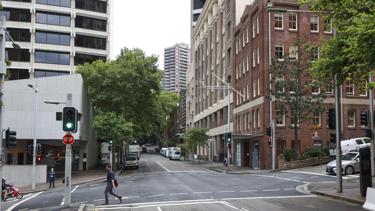 Woman charged after man, 82, hit by car in Sydney CBD