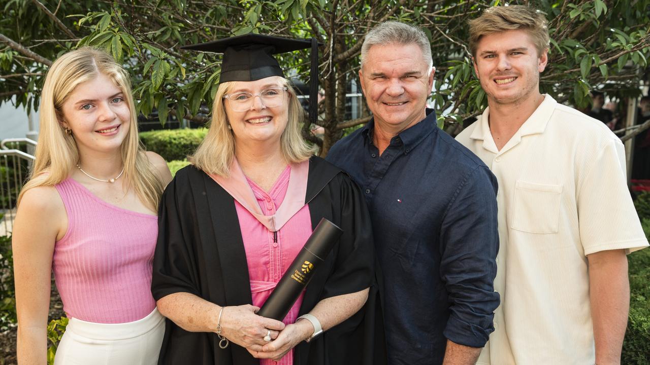 Master of Education graduate Megan Fogelis with family (from left) Jana, Peter and Stuart Fogelis at a UniSQ graduation ceremony at Empire Theatres, Tuesday, February 13, 2024. Picture: Kevin Farmer