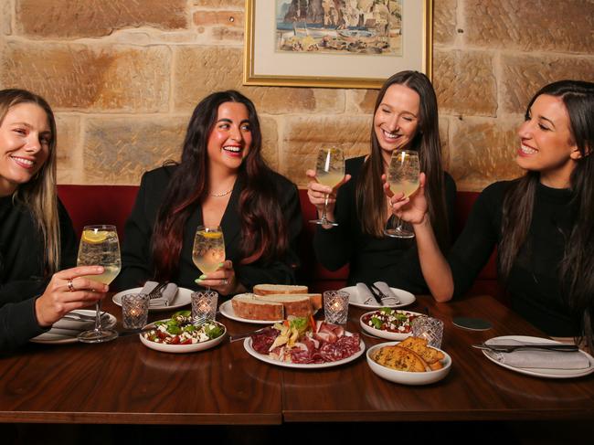 SYDNEY, AUSTRALIA - JULY 09 2023:The rise of bottomless brunches have changed the dating game, with more women day drinking and less likely to go out at night. Alex Rodd, tulin sevgin, Georgia Boward abd Carina Anderson are seen enjoying a bottomless brunch at the Milli Vini in Syrry Hills, Sydney. Picture: Newscorp Daily Telegraph/ Gaye Gerard