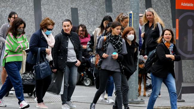 Limited mask wearing in the Brisbane CBD last week, despite an increase in Covid and flu cases. Picture: David Clark