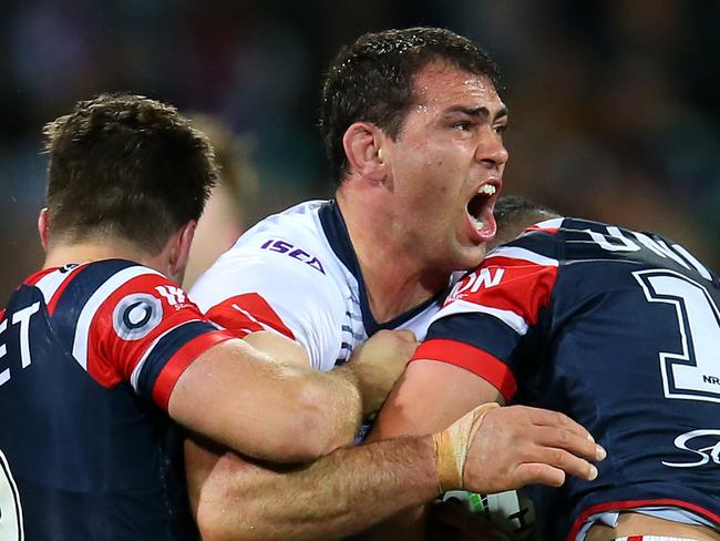 SYDNEY, AUSTRALIA - SEPTEMBER 28:  Dale Finucane of the Storm is tackled during the NRL Preliminary Final match between the Sydney Roosters and the Melbourne Storm at the Sydney Cricket Ground on September 28, 2019 in Sydney, Australia. (Photo by Jason McCawley/Getty Images)