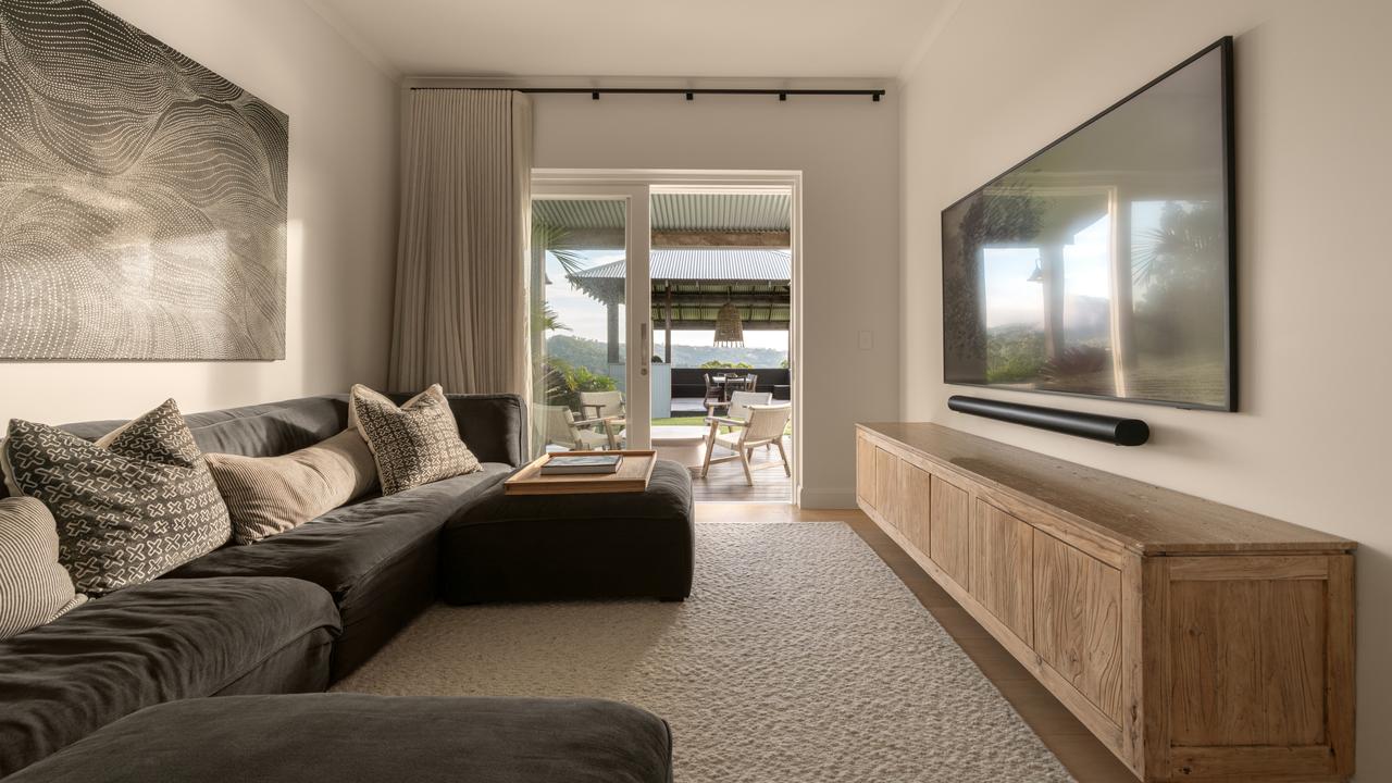 The media room also opens to the outdoor living spaces. Picture: Supplied