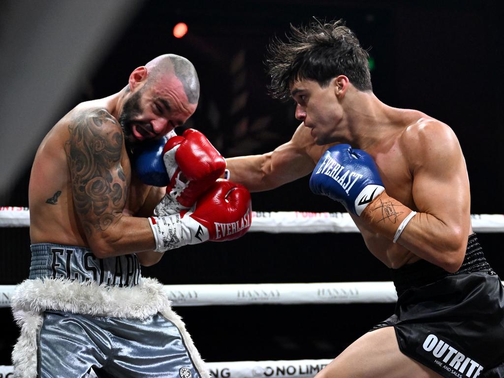 Brock Jarvis (R) gets through the defence of Adrian Rodriguez. Pictures: No Limit Boxing/Gregg Porteous