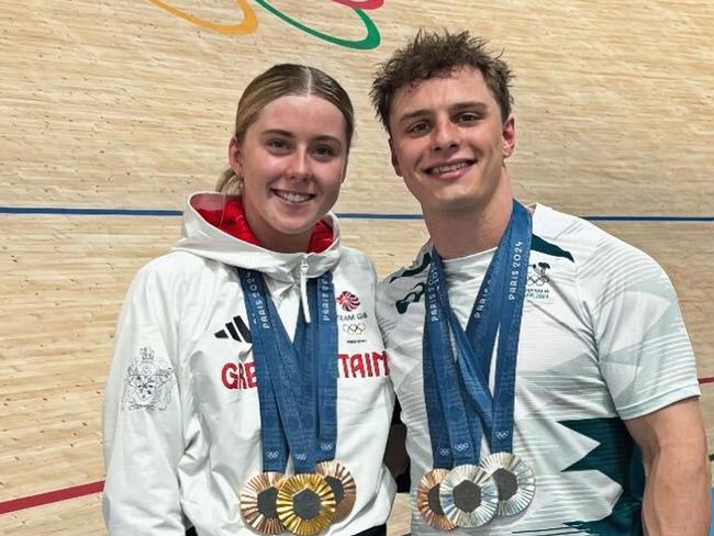 (L-R) British track cyclist Emma Finucane and Australian track cyclist Matt Richardson pose with their medals at the conclusion of the Paris Olympic Games. Richardson will defect to Team GB. The pair are a couple.