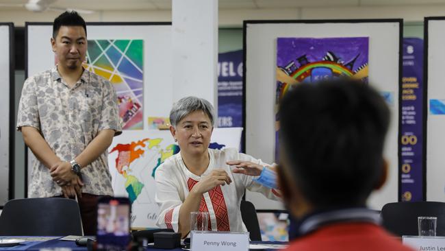 Foreign minister, Penny Wong, with her brother James Wong at Kinabalu International School, at Kota Kinabalu in Malaysia this week. Photo: Joshua Paul