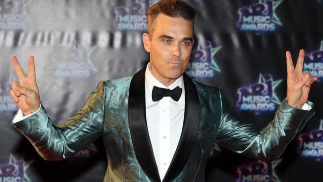 The always entertaining Robbie Williams should be singing for his supper at the ARIAs. Picture: Valery Hache/AFP