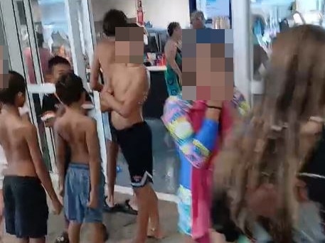 Screen grabs from video taken by an enraged parent who was mortified to see every Aboriginal child kicked out of the pool at the Inverell Aquatic Centre. Image: Facebook/Thomas Davis.