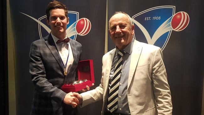 Plenty Valley's Callum Nankervis receives his award from VSDCA president Phil O'Meara. Picture: Ben Higgins