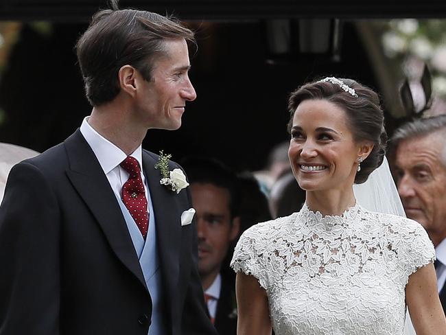 Pippa Middleton and James Matthews smile after their wedding at St Mark's Church. Picture: Getty