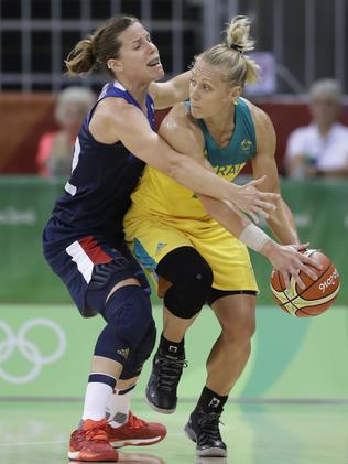 France guard Gaelle Skrela, left, guards Australia guard Erin Phillips.