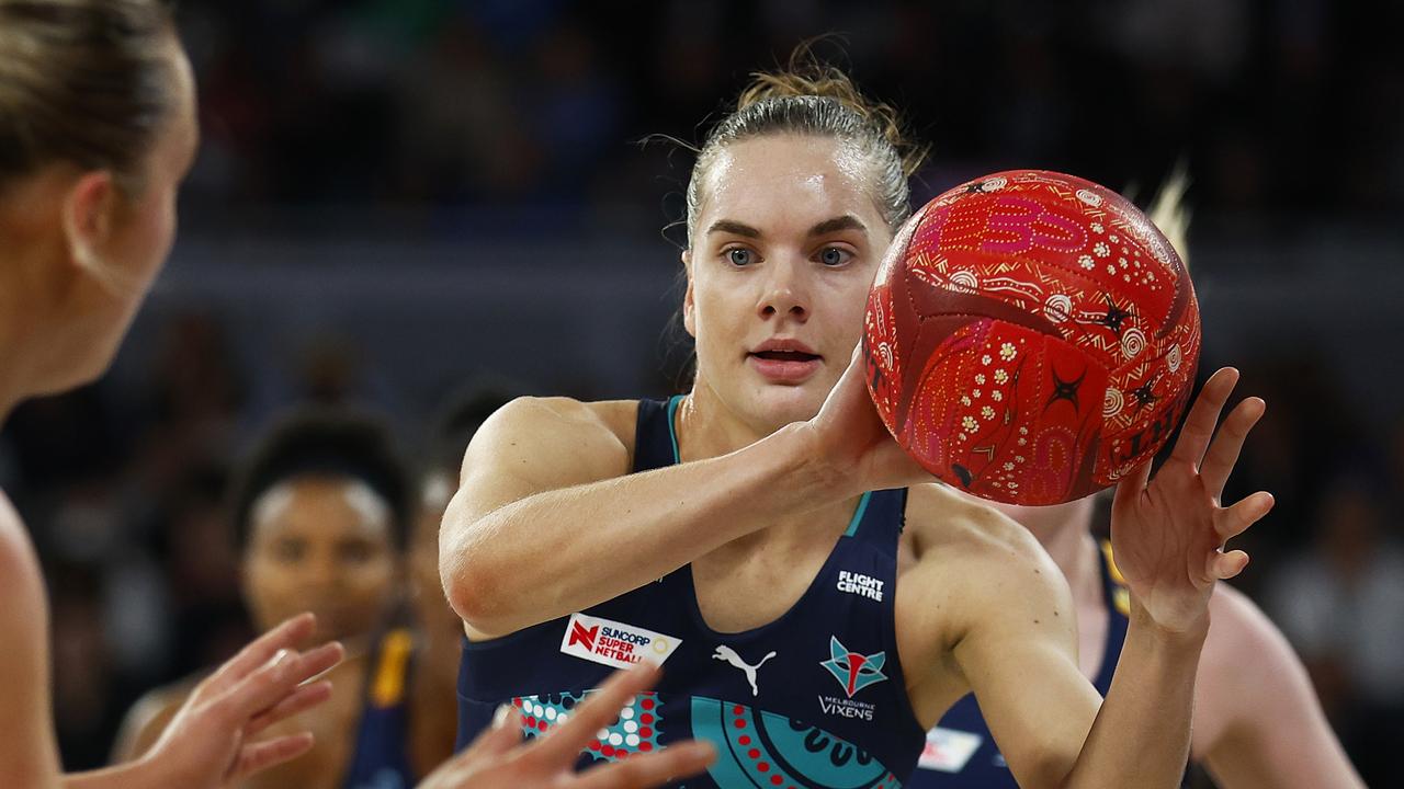 MELBOURNE, AUSTRALIA – MAY 29: Kiera Austin of the Vixens passes the ball during the round 12 Super Netball match between Melbourne Vixens and Sunshine Coast Lightning at John Cain Arena, on May 29, 2022, in Melbourne, Australia. (Photo by Daniel Pockett/Getty Images)