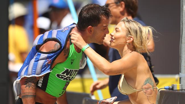 Tammy Hembrow embraces partner and Nutri-Grain Ironman Matt Poole. Picture: Chris Hyde