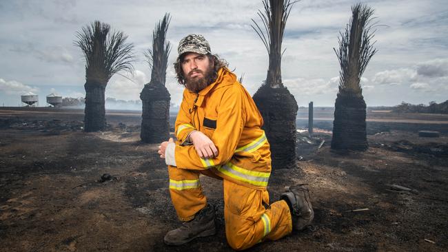 Parndana Cricket Club president and captain Matt Cooper on his property after fires blazed through it this month. Picture: Brad Fleet