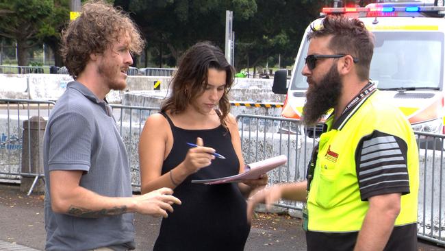 The couple rescued from the burning car. Picture: Onscene Bondi