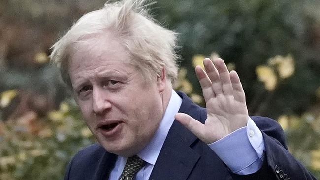 Prime Minister Boris Johnson returns to Downing Street from Buckingham Palace after he sought permission to form the next government during an audience with Queen Elizabeth II