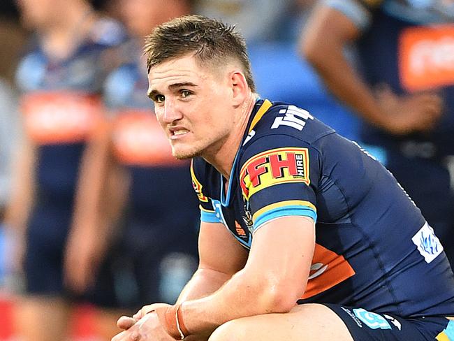 A J Brimson of the Titans looks on following the Round 10 NRL match between the Gold Coast Titans and the Canterbury Bulldogs at CBUS Super Stadium on the Gold Coast, Saturday, May 18, 2019. (AAP Image/Dave Hunt) NO ARCHIVING, EDITORIAL USE ONLY