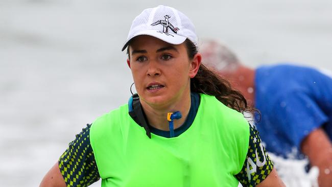 Central Coast paddler Jemma Smith on her way to winning an ocean canoe world title.