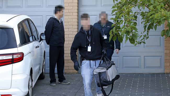 A duffel bag allegedly containing 20kg of cocaine was also recovered in the raid.