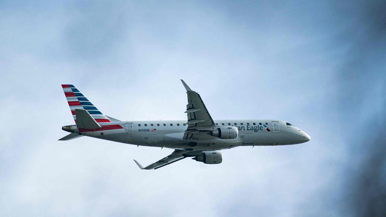 An American Airlines plane takes off from Reagan National Airport after the crash. (Photo by Al Drago / GETTY IMAGES NORTH AMERICA / Getty Images via AFP)