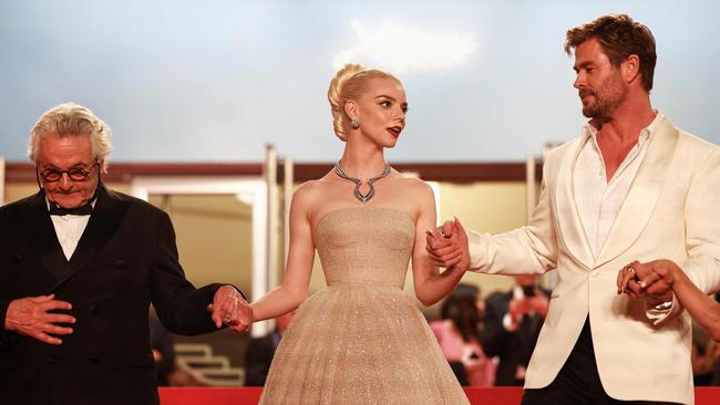 Australian actor Chris Hemsworth (R) and British-US actor Anya Taylor-Joy (C) and Australian director and screenwriter George Miller pose after the screening of the film "Furiosa: A Mad Max Saga" at the 77th edition of the Cannes Film Festival in Cannes, southern France, on May 15, 2024. Picture: AFP