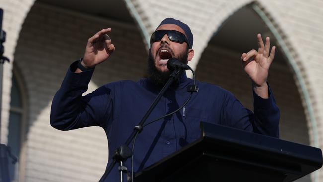 Sheikh Ibrahim Dadoun addresses the crowd at a Hizb ut-Tahrir rally outside Lakemba Mosque on Monday afternoon, on the anniversary of the October 7 attacks. Picture: Jane Dempster/The Australian.