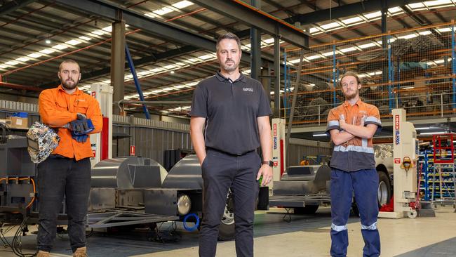 Custom Denning Head of Operations Daniel Bale with welder Jake Andrews and apprentice Bowen Pearce at the St Marys factory. Picture Thomas Lisson