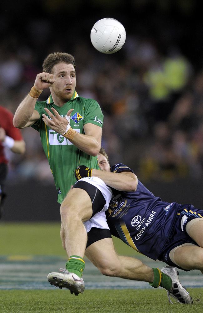 Australia's Liam Shiels tackles Ireland's Zach Tuohy during the First International Rules Series match at Etihad Stadium in Melbourne, Friday, Oct. 28, 2011. Picture: Martin Philbey