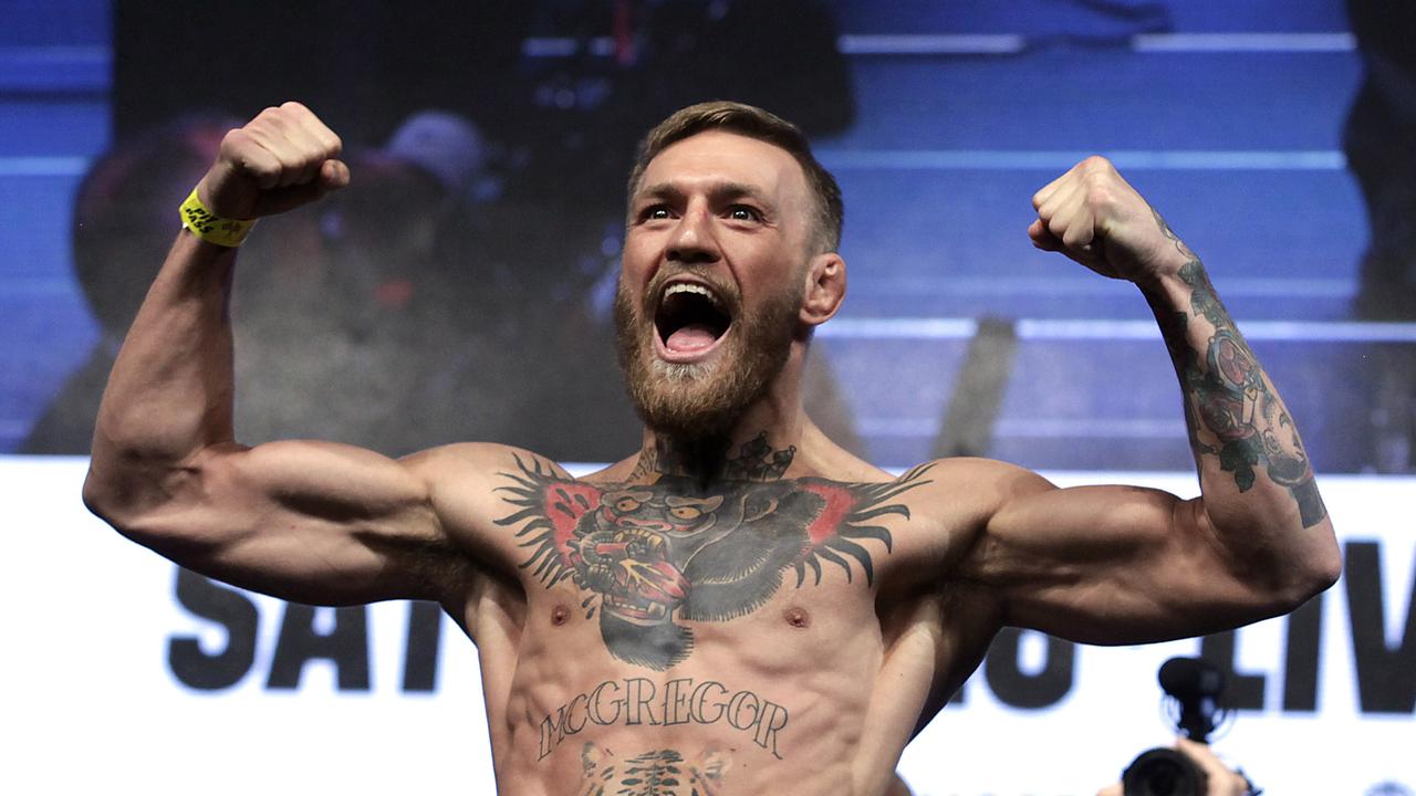 (FILES) This file photo taken on August 26, 2017 shows MMA figher Connor Mcgregor posing during a weigh-in, in Las Vegas, Nevada. - Conor McGregor was taken into custody in Corsica on suspicion of attempted sexual assault and sexual exhibition, announced the public prosecutor's office in Bastia on September 12, 2020. (Photo by John GURZINSKI / AFP)